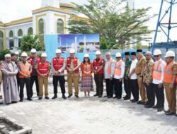 Peletakan batu pertama Pembangunan Menara Masjid Agung H Achmad Bakrie Kisaran