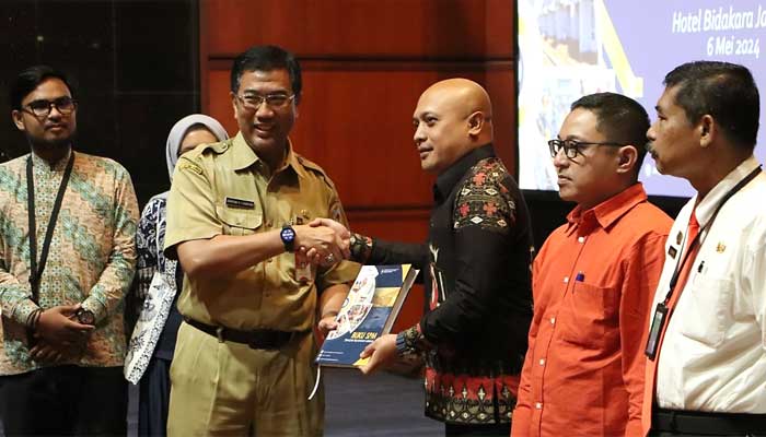 Buku-Panduan-Penerapan-SPM-di-Daerah Peluncuran buku panduan SPM di Hotel Bidakara, Jakarta